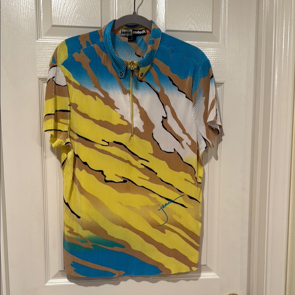 Jamie Sadock Blue And Yellow Golf Blouse With Dynamic Stripes And Gold Detailing